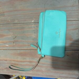 A teal nanette Lepore wristlet
